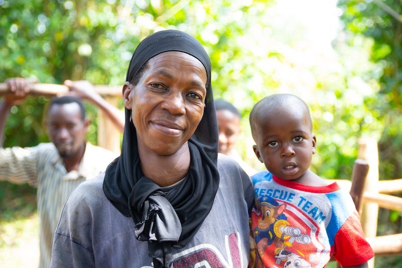 african mother and child smiling at camera