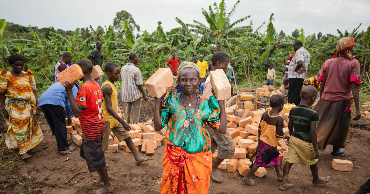community members working together to construct a clean water facility.