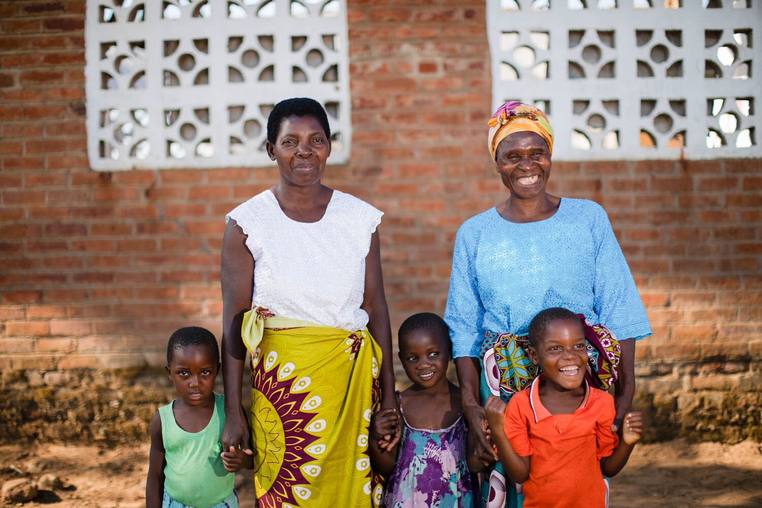 group of women and children, beneficiaries of copred