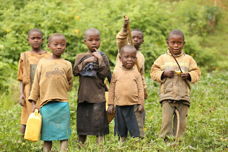 group of african children with jerrycans